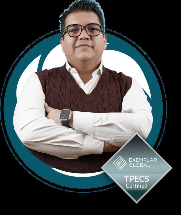Professional headshot of a man wearing glasses, white dress shirt, and burgundy vest with arms crossed, featuring TPECS Certified badge